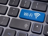 Immagine che mostra un pulsante sulla tastiera di un computer con il logo Wi-Fi