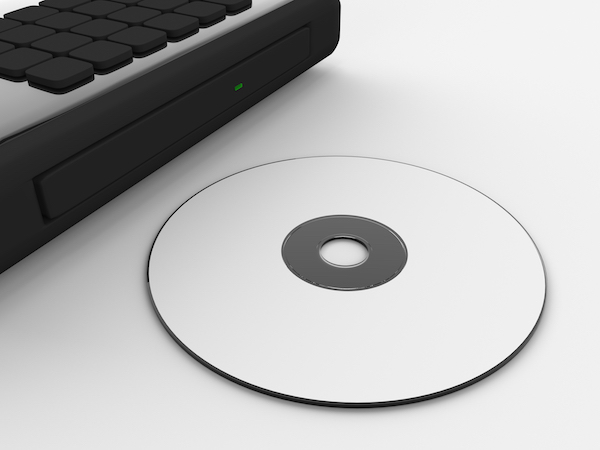 Immagine che mostra un CD audio da inserire nel PC